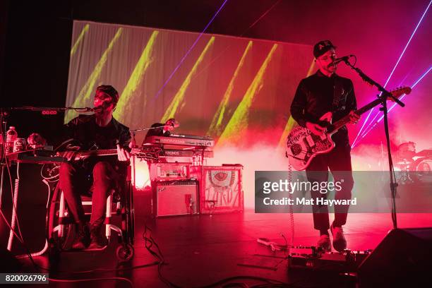 Eric Howke and John Gourley of Portugal. The Man perform on stage at Paramount Theatre on July 20, 2017 in Seattle, Washington.
