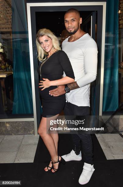 Sarah Nowak and Dominic Harrison attend the 'Cotidiano Restaurant Opening' on July 20, 2017 in Munich, Germany.