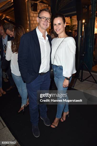Holger Stromberg and his wife Nikita Stromberg attend the 'Cotidiano Restaurant Opening' on July 20, 2017 in Munich, Germany.