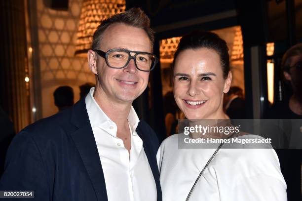 Holger Stromberg and his wife Nikita Stromberg attend the 'Cotidiano Restaurant Opening' on July 20, 2017 in Munich, Germany.