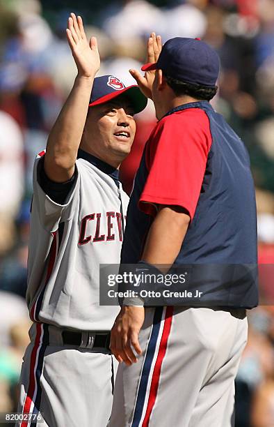 Pitcher Masahide Kobayashi of the Cleveland Indians celebrates with Asdrubal Cabrera after defeating the Seattle Mariners 9-6 on July 19, 2008 at...