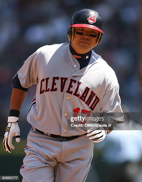 Shin-soo Choo of the Cleveland Indians rounds the bases after hitting a two-run home run in the first inning against the Seattle Mariners on July 19,...