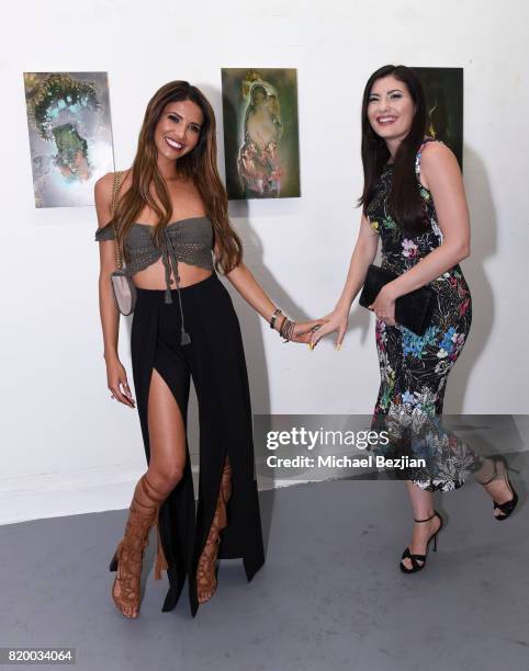Designer CJ Franco and Celeste Thorson arrive at Val Kilmer's Pop-Up Art Exhibition - "Icon Go On, I'll Go On" VIP Opening Reception at The Gabba...