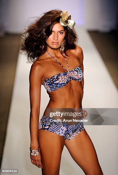 Model walks the runway at Syla by Sylvie Cachay 2009 collection fashion show during Mercedes Benz Fashion Week Swim at the Raleigh Hotel on July 18,...