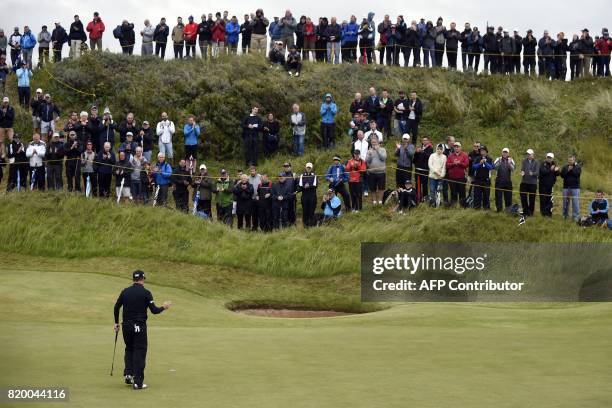 Golfer Zach Johnson reacts after making a birdie on the 2nd green during his second round on day two of the Open Golf Championship at Royal Birkdale...