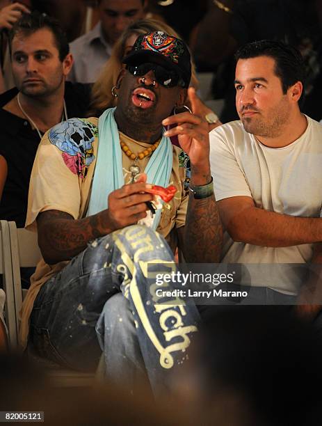 Former NBA player Dennis Rodman watches Ed Hardy Swimwear 2009 collection fashion show during Mercedes-Benz Fashion Week Swim at the Raleigh Hotel on...