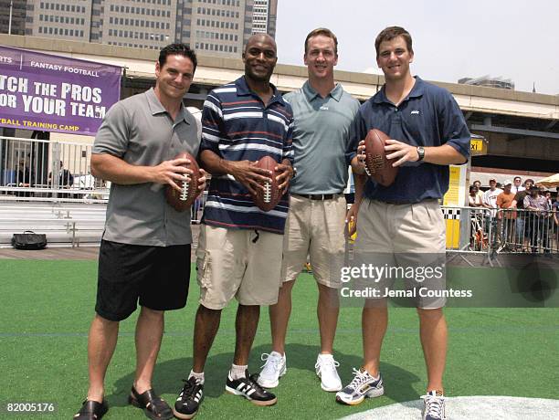 Jay Feely, Amani Toomer, Peyton Manning and Eli Manning at the 2005 Fantasy Football Training Camp held at the South Street Seaport on July 18, 2005...