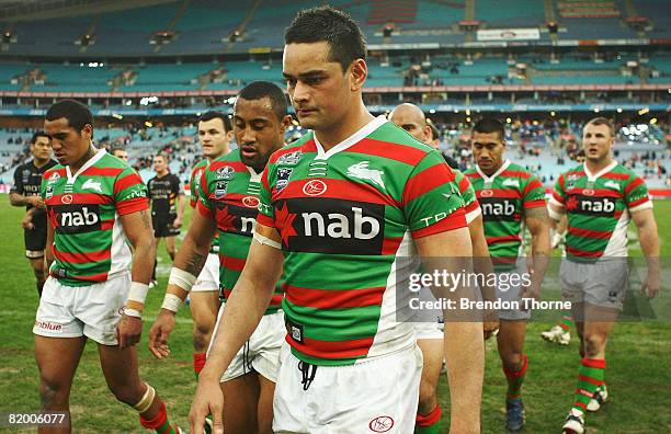 Rabbitohs players walk off dejected after going down to the Tigers during the round 19 NRL match between the South Sydney Rabbitohs and the Wests...