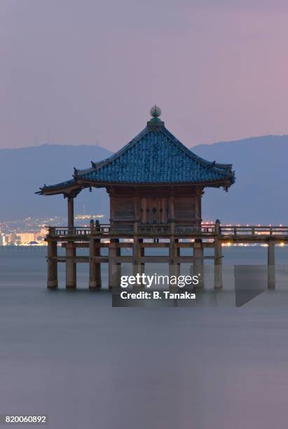 ukimido floating temple at twilight on lake biwa in japan's shiga prefecture - basho matsuo stock pictures, royalty-free photos & images