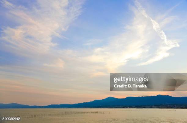 twilight view of lake biwa in japan's shiga prefecture - präfektur shiga stock-fotos und bilder