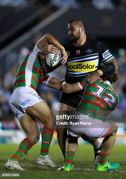 Andrew Fifita of the Sharks is tackled during the round 20 NRL match between the Cronulla Sharks and the South Sydney Rabbitohs at Southern Cross...