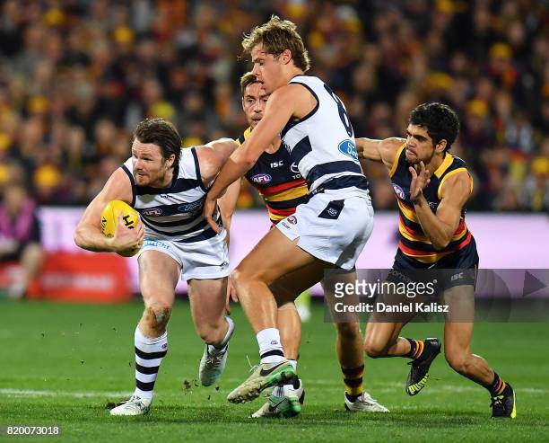 Patrick Dangerfield of the Cats competes for the ball during the round 18 AFL match between the Adelaide Crows and the Geelong Cats at Adelaide Oval...