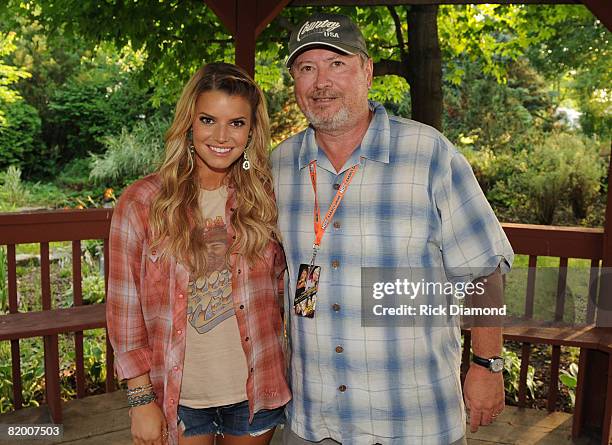 Singer/Songwriter Jessica Simpson and Booking Agent NEM Entertainment Gil Cunningham backstage during the 16th annual Country Thunder festival on...