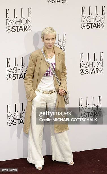 Scottish musician Annie Lennox poses for photographers as she arrives for the Elle Fashion Star 2008 awards at the Berlin Fashion Week on July 19,...