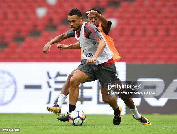 Francis Coquelin and Joe Willock of Arsenal during a training session at the Birds Nest stadium on July 21, 2017 in Beijing, China.