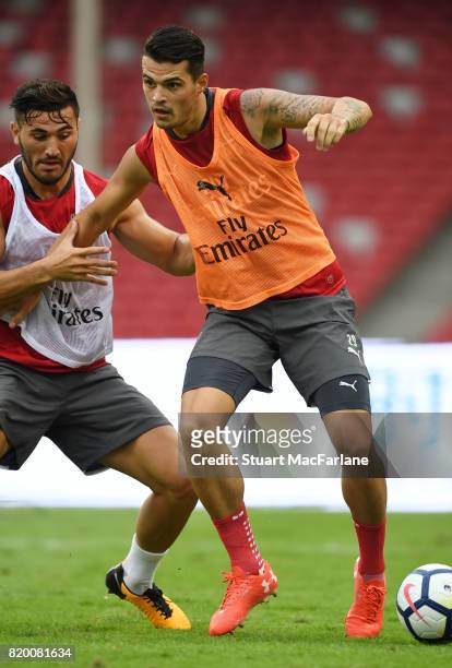 Sead Kolasinac and Granit Xhaka of Arsenal during a training session at the Birds Nest stadium on July 21, 2017 in Beijing, China.
