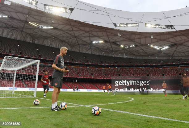 Arsenal manager Arsene Wenger during a training session at the Birds Nest stadium on July 21, 2017 in Beijing, China.