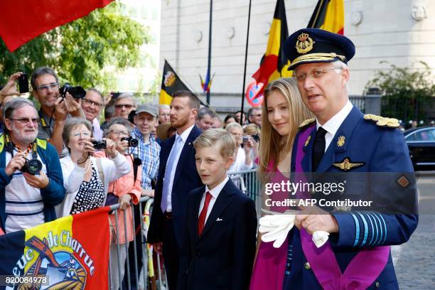 Prince Emmanuel, Crown Princess Elisabeth and King Philippe of Belgium leave after the Te Deum mass, at the Cathedral of St Michael and St Gudula in...