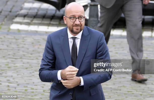 Belgian Prime Minister Charles Michel arrives for the Te Deum mass marking the Belgian National Day, at the Saint Michael and St Gudula Cathedral in...