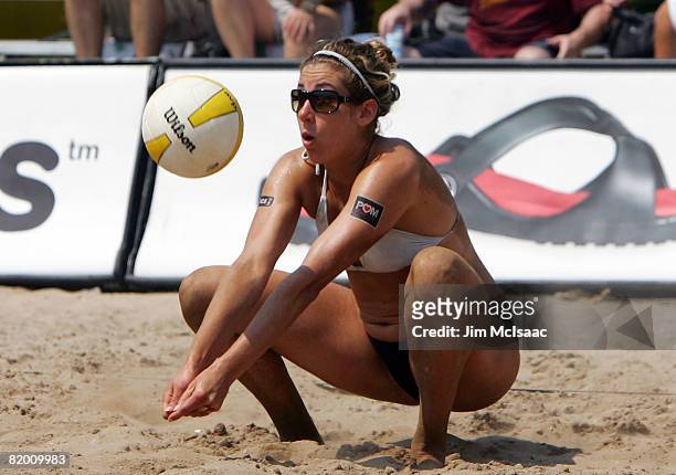 April Ross digs the ball during the women's quarter-finals of the AVP Brooklyn Open on July 20, 2008 at Coney Island in the Brooklyn borough of New...