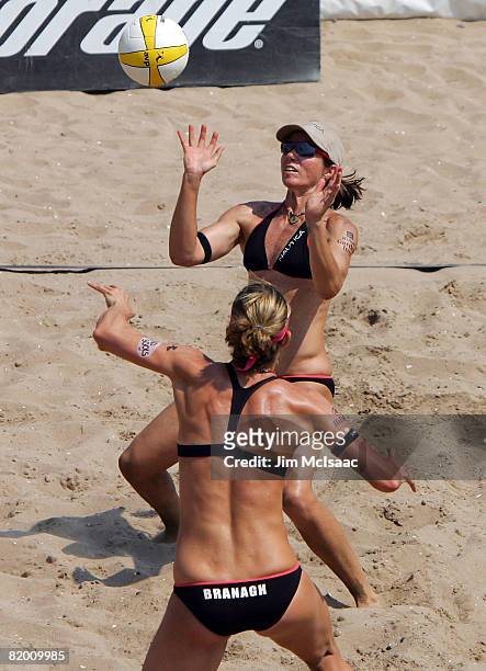 Elaine Youngs sets up teammate Nicole Branagh during the women's quarter-finals of the AVP Brooklyn Open on July 20, 2008 at Coney Island in the...