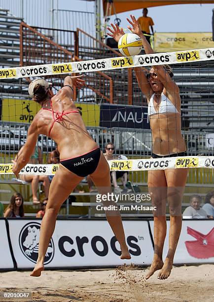 April Ross blocks a shot against Elaine Youngs during the women's quarter-finals of the AVP Brooklyn Open on July 20, 2008 at Coney Island in the...