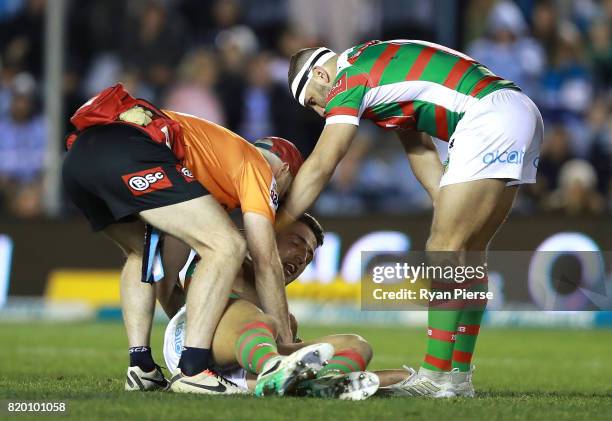 Sam Burgess of the Rabbitohs leaves the field with an injury during the round 20 NRL match between the Cronulla Sharks and the South Sydney Rabbitohs...