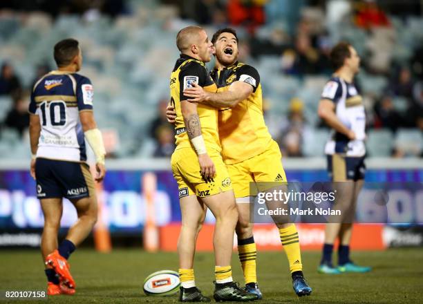 Perenara and Nehe Milner-Skudder of the Hurricanes celebrate a try by Perenara during the Super Rugby Quarter Final match between the Brumbies and...