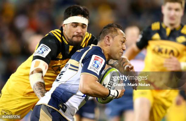 Christian Lealiifano of the Brumbies runs the ball during the Super Rugby Quarter Final match between the Brumbies and the Hurricanes at Canberra...