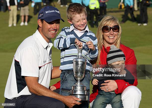 Padraig Harrington of the Republic of Ireland celebrates with the Claret Jug with wife Caroline and sons Patrick and Ciaran after winning by 4...