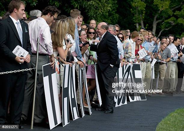 Outgoing US White House Deputy Chief of Staff Joe Hagin greets a wellwisher who came to bid him farewell as he arrived aboard presidential helicopter...