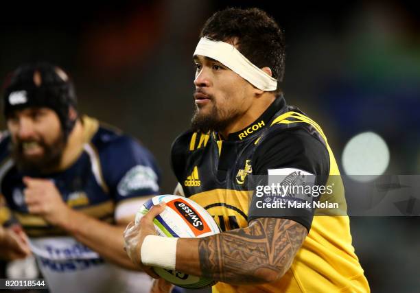 Vaea Fifita of the Hurricanes runs the ball during the Super Rugby Quarter Final match between the Brumbies and the Hurricanes at Canberra Stadium on...