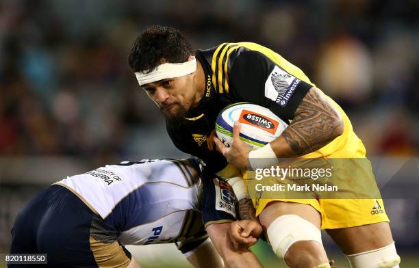 Vaea Fifita of the Hurricanes runs the ball during the Super Rugby Quarter Final match between the Brumbies and the Hurricanes at Canberra Stadium on...