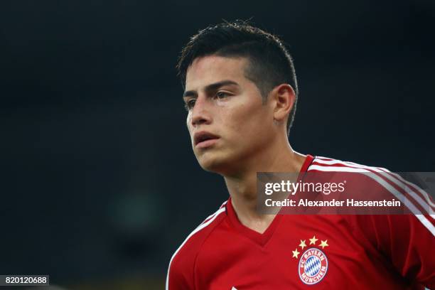 James Rodriguez of FC Bayern Muenchen looks on during a training session at Shenzhen Universiade Sports Centre during the Audi Summer Tour 2017 on...