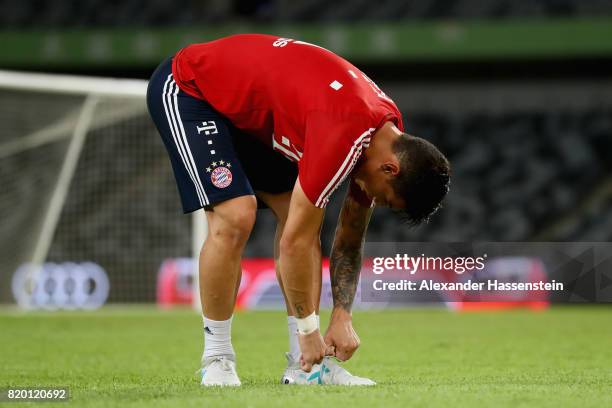 James Rodriguez of FC Bayern Muenchen looks on during a training session at Shenzhen Universiade Sports Centre during the Audi Summer Tour 2017 on...