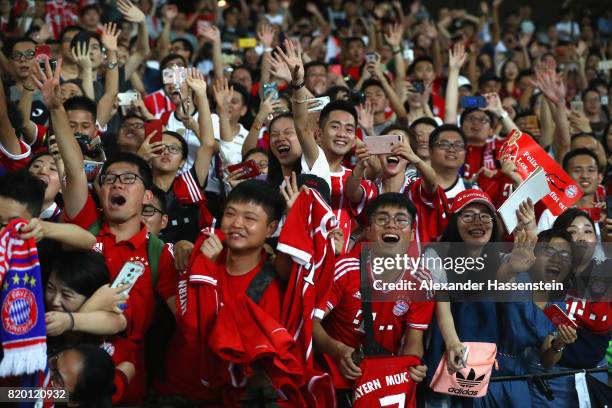 Supporters of FC Bayern Muenchen during a training session at Shenzhen Universiade Sports Centre during the Audi Summer Tour 2017 on July 21, 2017 in...