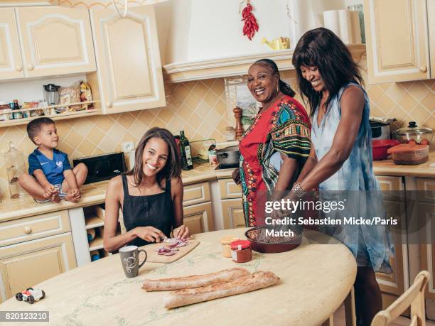 Fashion model Cindy Bruna is photographed with her mother Eleonore, her grand-mother Eugenie and her nephew Ilan for Paris Match on May 29, 2017 in...