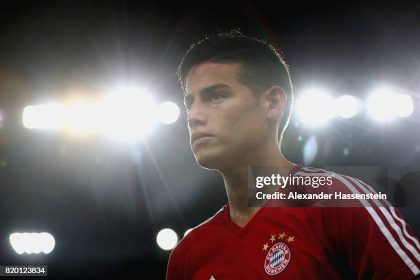 James Rodriguez of FC Bayern Muenchen looks on during a training session at Shenzhen Universiade Sports Centre during the Audi Summer Tour 2017 on...