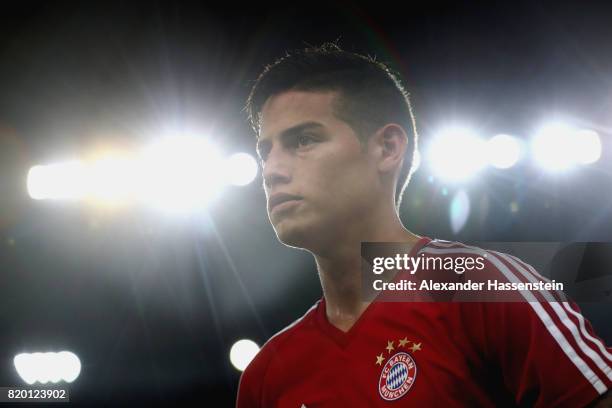 James Rodriguez of FC Bayern Muenchen looks on during a training session at Shenzhen Universiade Sports Centre during the Audi Summer Tour 2017 on...