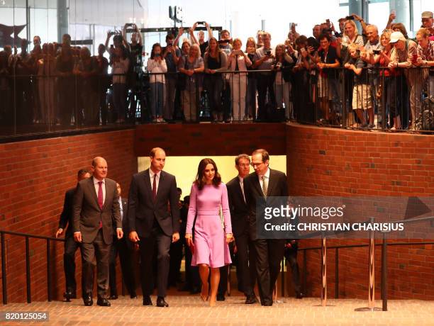 Britain's Prince William , Duke of Cambridge, his wife Kate, the Duchess of Cambridge , Mayor of Hamburg Olaf Scholz and museum director Peter Tamm...