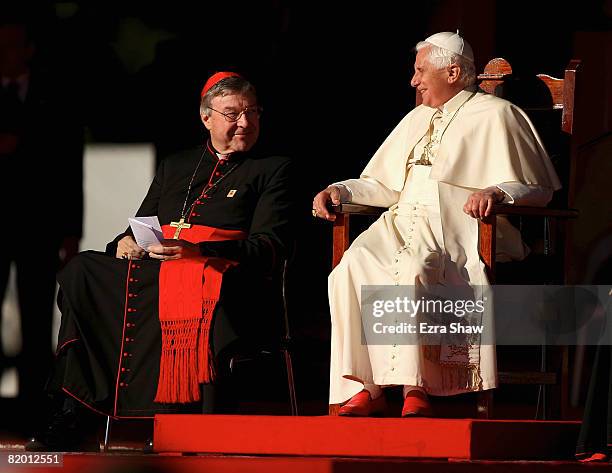 His Holiness Pope Benedict XVI and Cardinal George Pell smile at one another while thanking all the volunteers at The Domain on July 21, 2008 in...