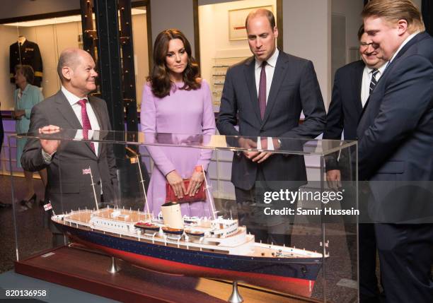 Prince William, Duke of Cambridge and Catherine, Duchess of Cambridge depart after a visit to the Maritime Museum to celebrate the joint UK-German...