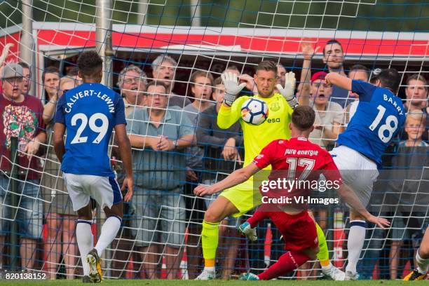 Dominic Calvert-Lewi,n of Everton FC, goalkeeper Maarten Stekelenburg of Everton FC, Marko Kvasina of FC Twente, Gareth Barry of Everton FC during...