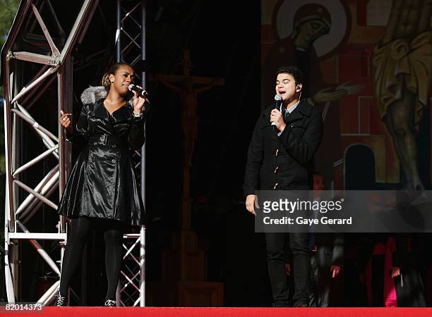 Singer Paulini and Guy Sebastian perform onstage as His Holiness Pope Benedict concludes his World Youth Day activities by thanking all the...