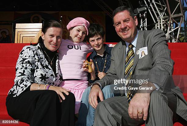 Sophie Delezio, her parents Ron and Carolyn and brother Mitchell pose as His Holiness Pope Benedict concludes his World Youth Day activities by...