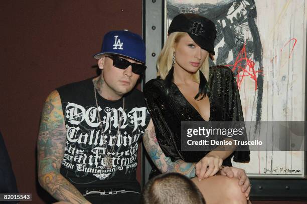 Benji Madden and Paris Hilton attend the Wasted Space Rock Club grand opening at the Hard Rock Hotel And Casino - Las Vegas on JUly 19, 2008 in Las...