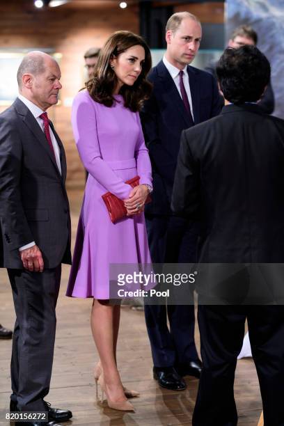 First Mayor of Hamburg Olaf Scholz and Museum director Peter Tamm give Prince William, Duke of Cambridge and Catherine, Duchess of Cambridge a tour...