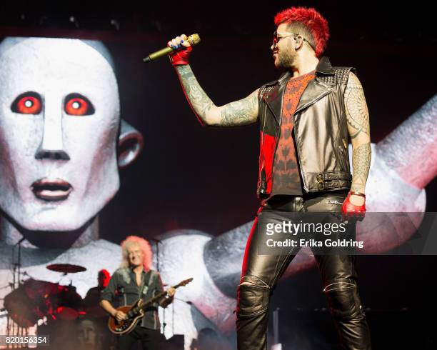 Brian May and Adam Lambert of Queen + Adam Lambert perform at The Palace of Auburn Hills on July 20, 2017 in Auburn Hills, Michigan.