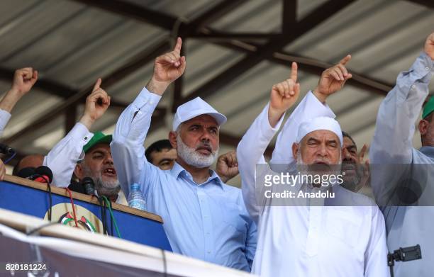Ismail Haniya , Head of the Political Bureau of Hamas, and Deputy Speaker of Palestinian Parliament Ahmad Bahar attend protest rally organized by the...