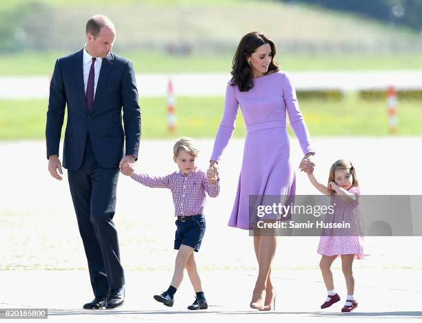 Prince William, Duke of Cambridge, Catherine, Duchess of Cambridge, Prince George of Cambridge and Princess Charlotte of Cambridge view helicopter...